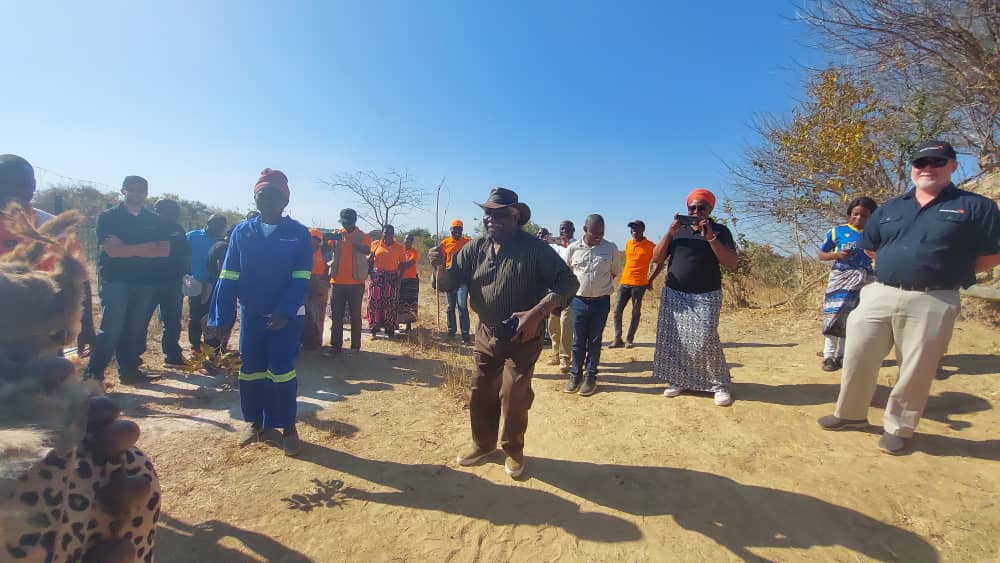 World Vision board member Ambassador Mumba Kapumpa dancing with goat farmers