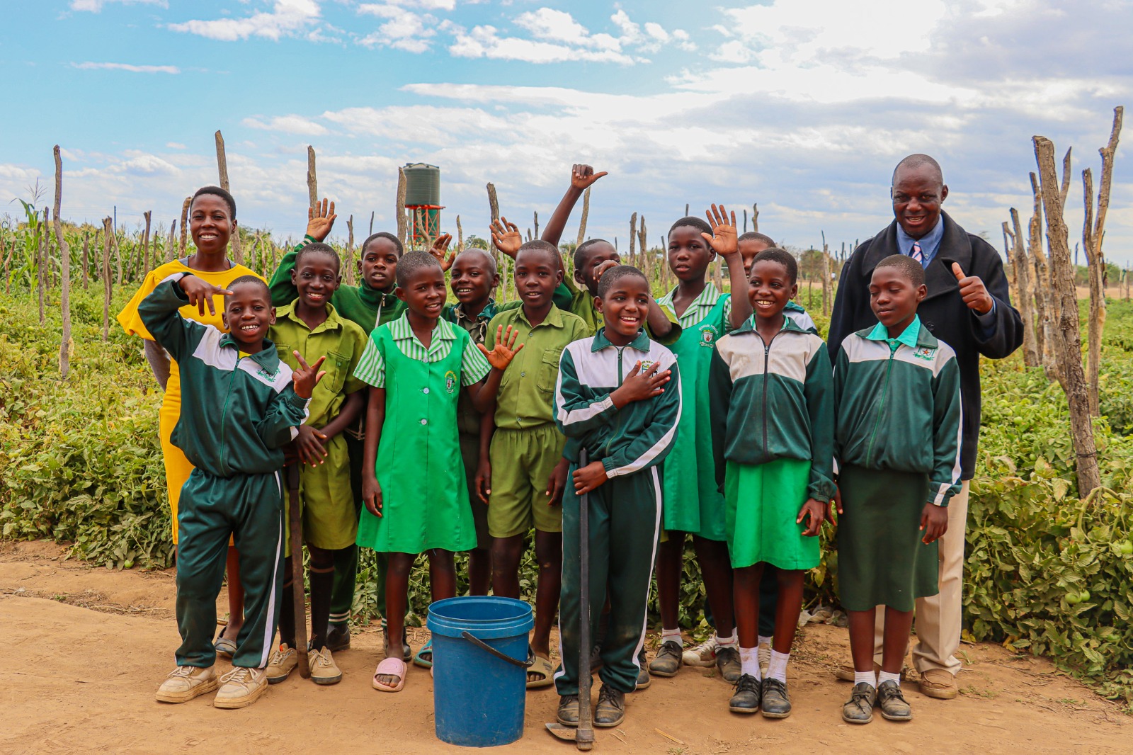 Mr. Masimba (far right) pose for a picture with members of the Garden Club