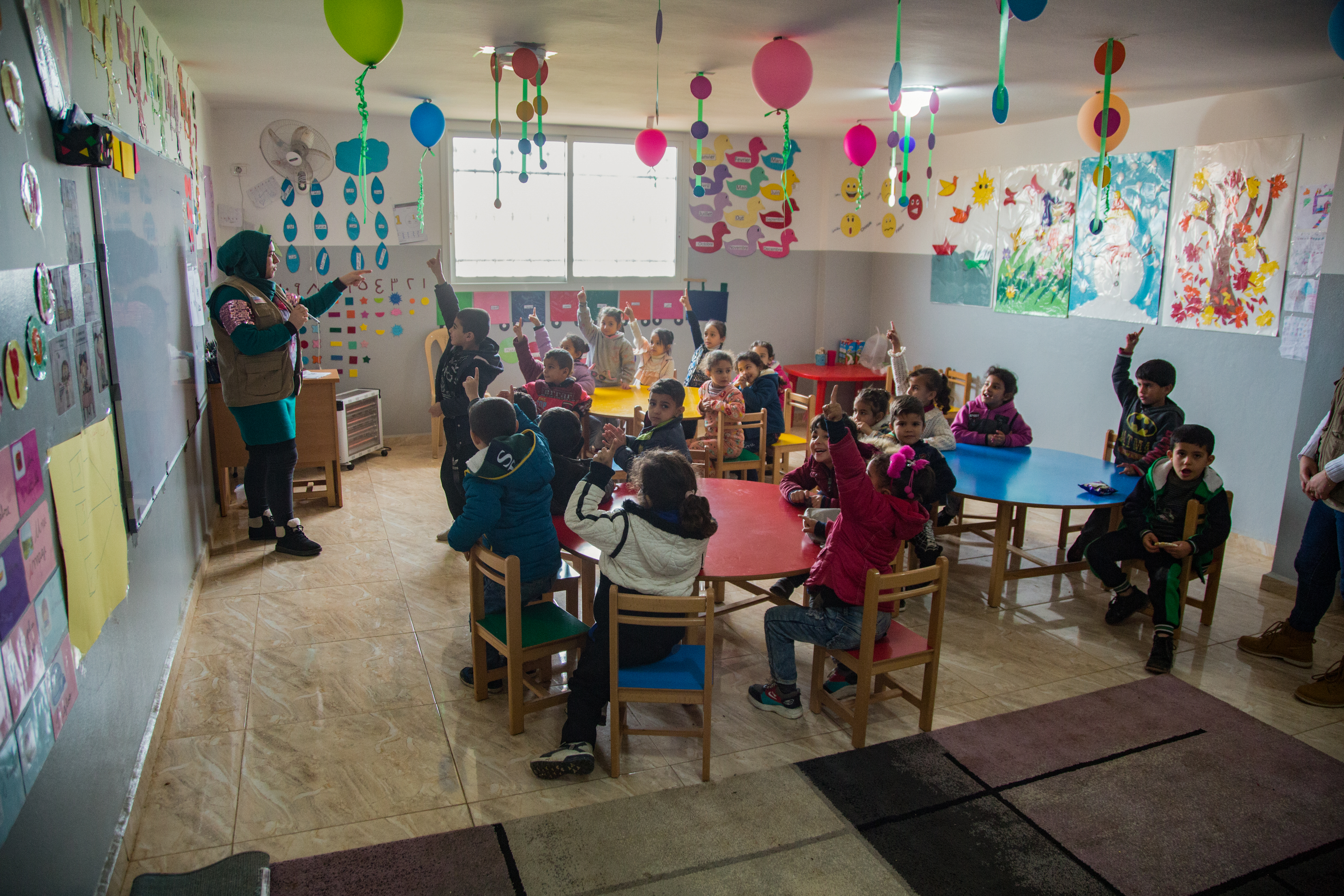 Children participating in class