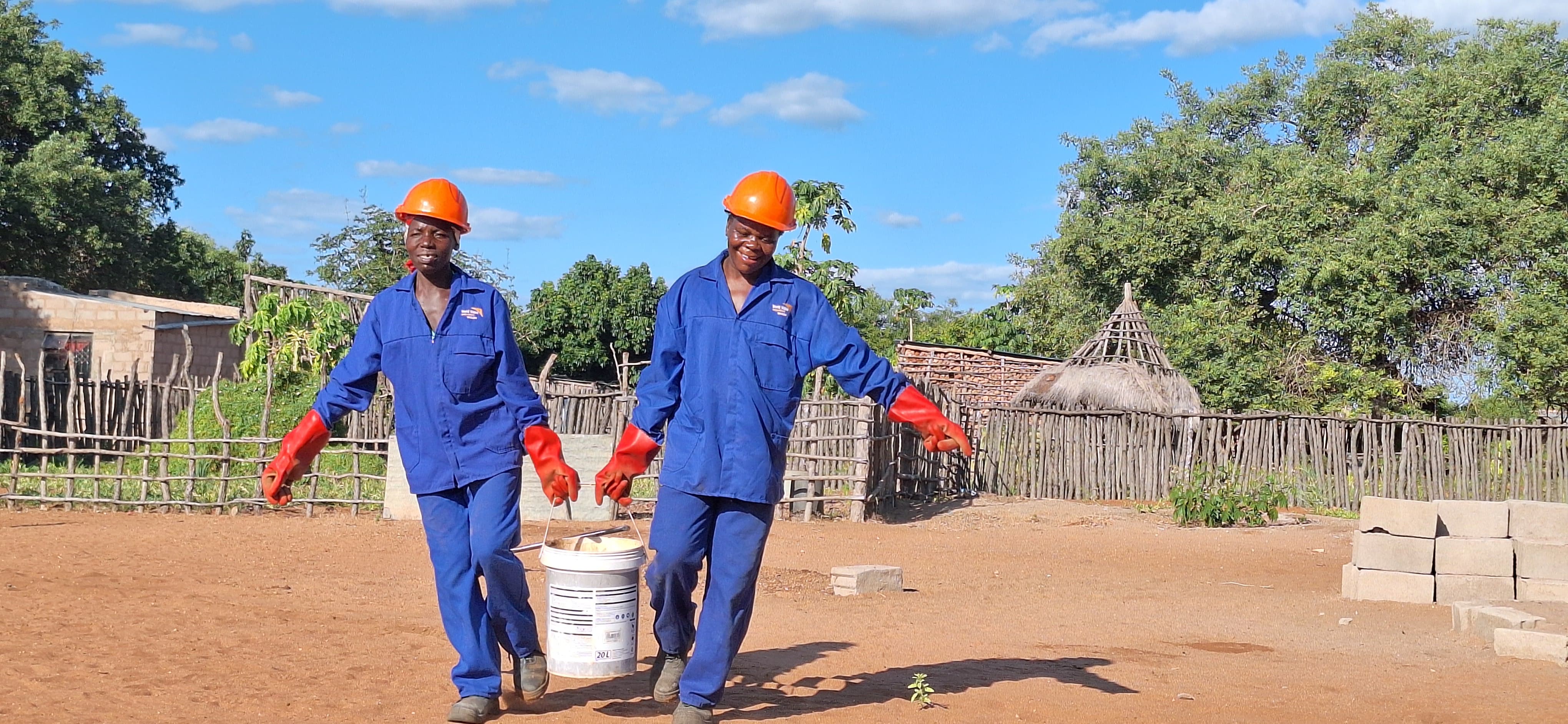 Gilda Chaúque and Lúcia Ponja working hard together in Sanitation Marketing activities 