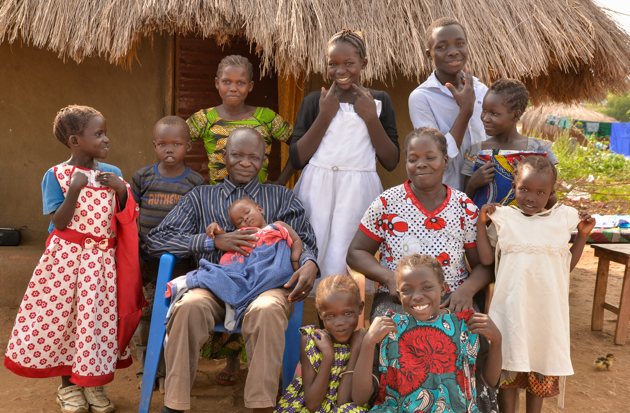 Pastor Isaac with his family in Yoyo village, Bidibidi refugee settlement 