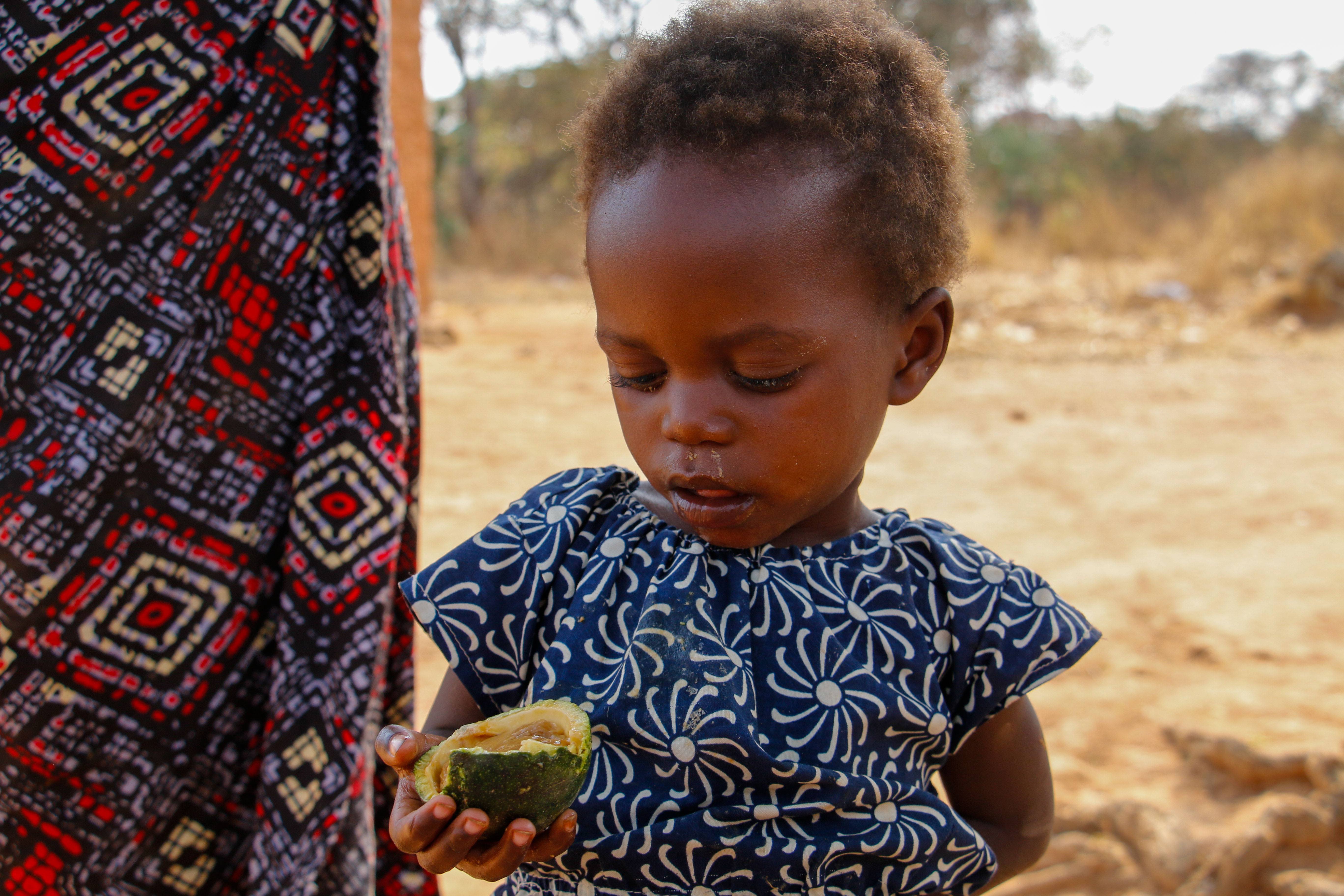 Isabel eating wild fruit Maboque