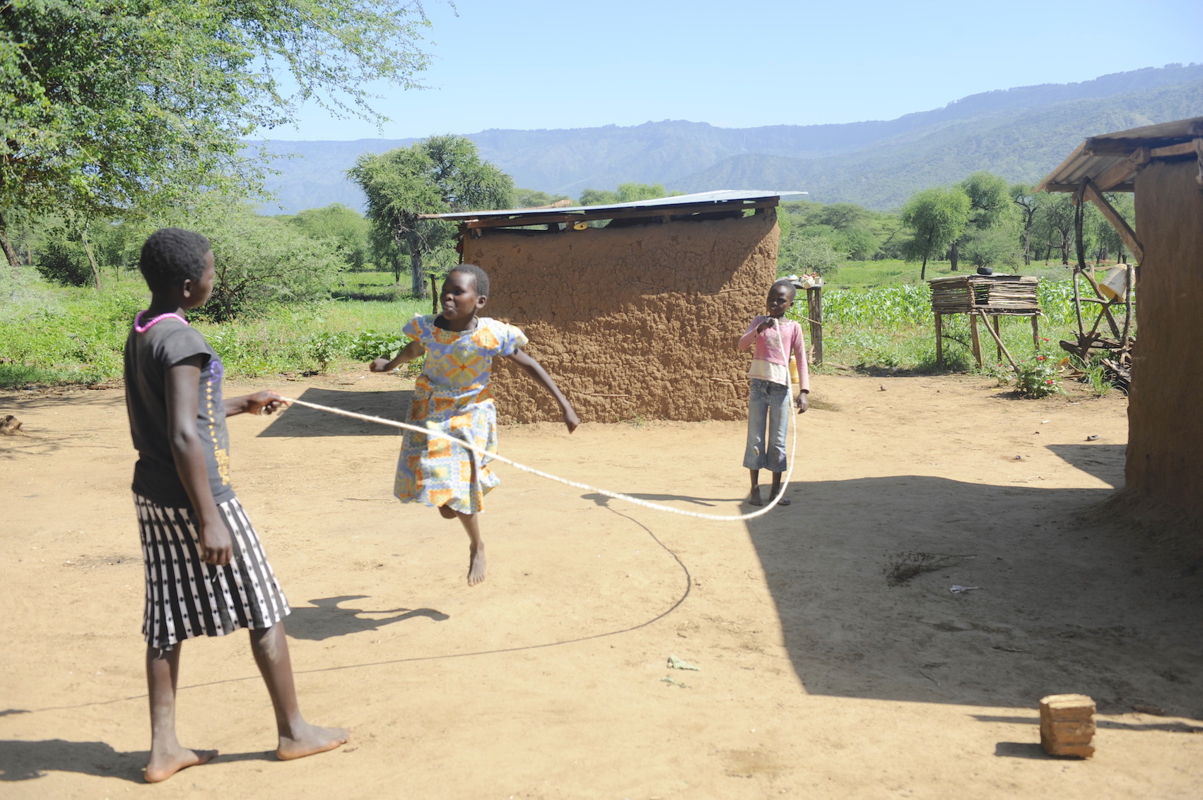 Left to Right -Philaris (14) ,Melvin (12) and Shanice (8) skipping rope at their home in Elgeyo Marakwet County, Kenya. Playtime is helping them beat stress and cope effectively with COVID-19