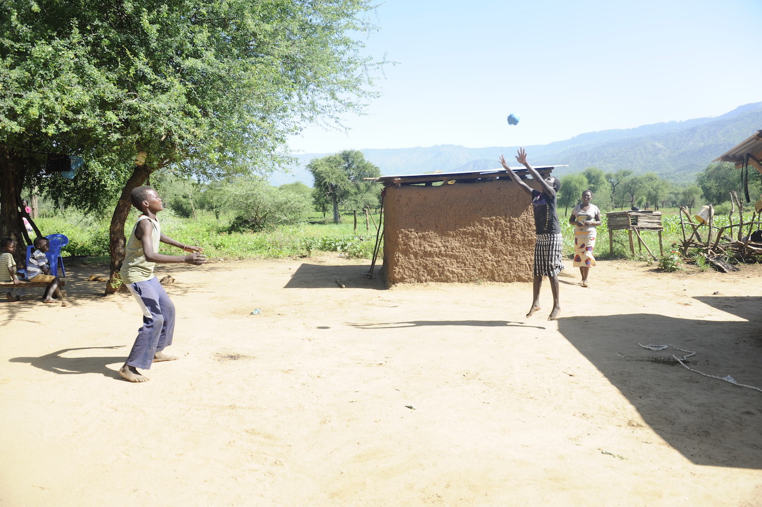 Dennis (16) and his sister Philaris (14) playing ball at their home in Elgeyo Marakwet County, Kenya. Playtime is helping them beat stress and cope effectively with COVID-19.