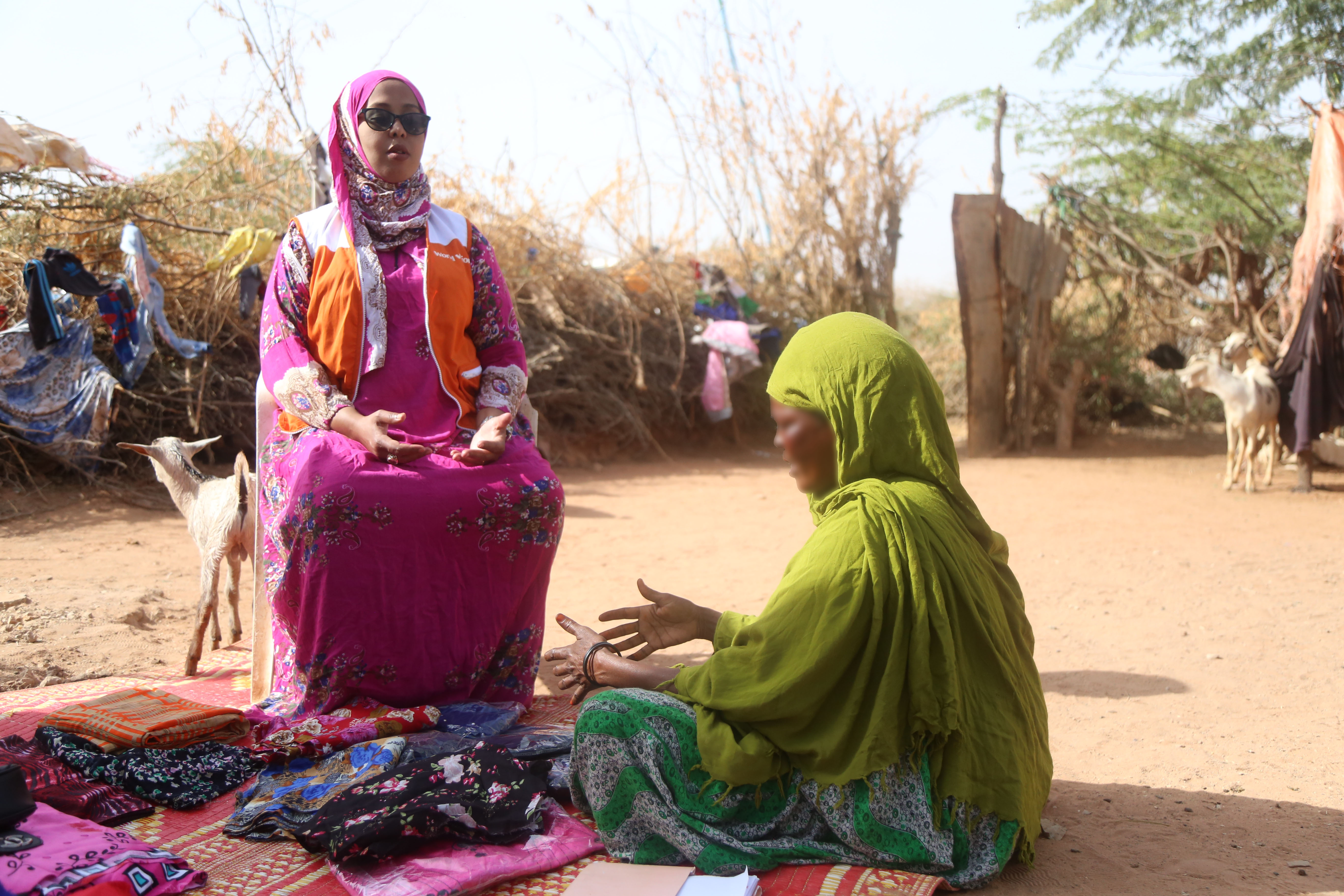 Hoodo Hassan (L) counselling Khadra (R) 