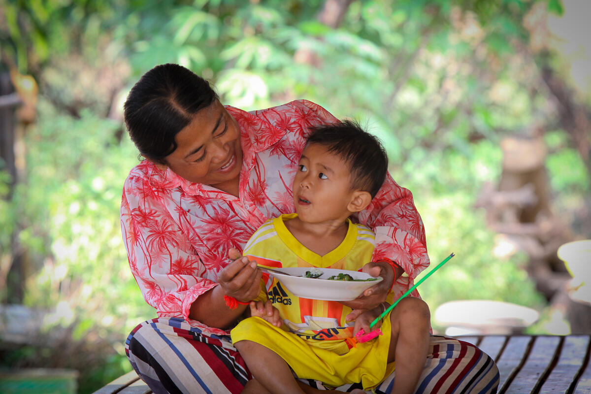 Kim spends time with her grandson in Cambodia.