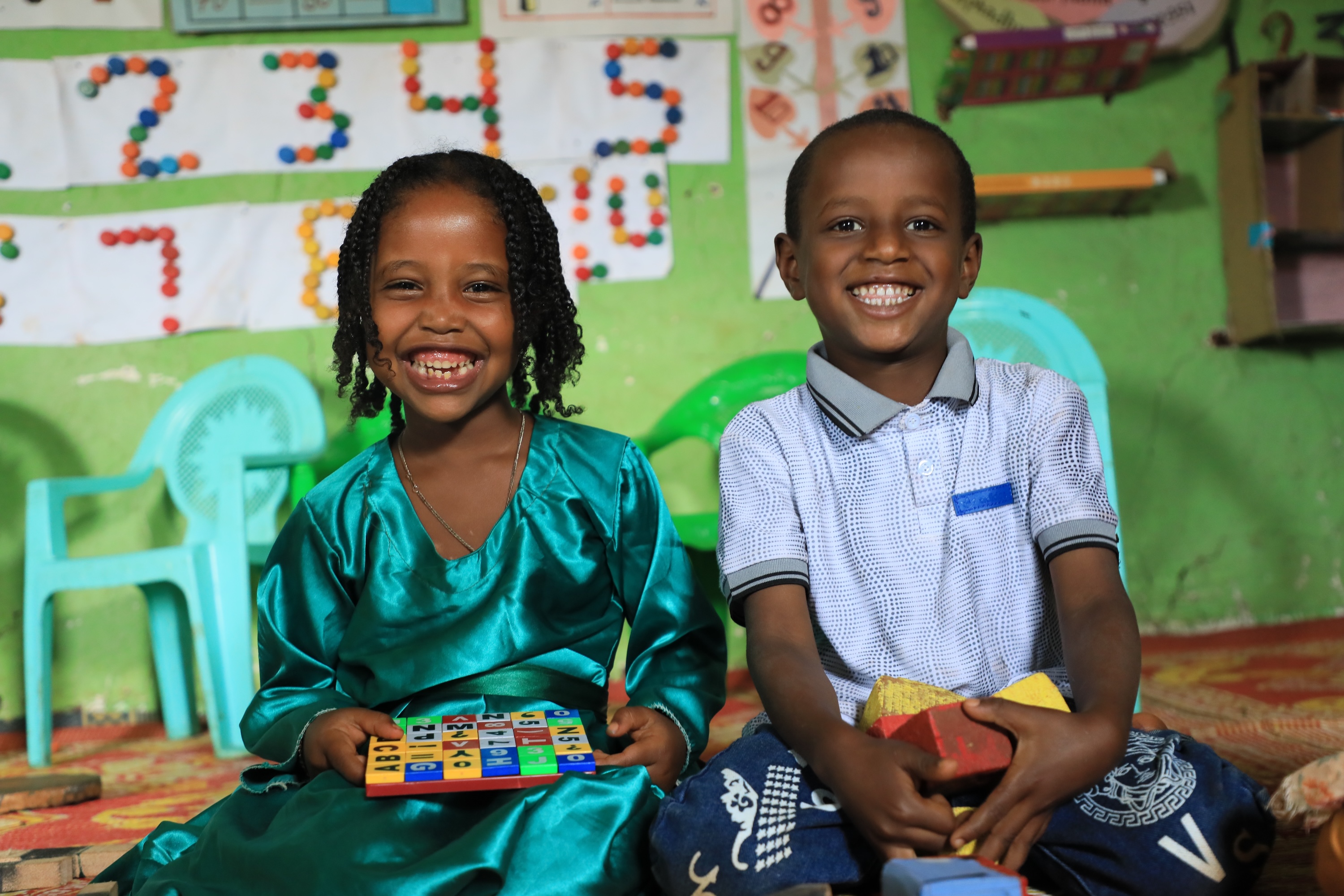 Firomi playing with her friends at the ECD centre