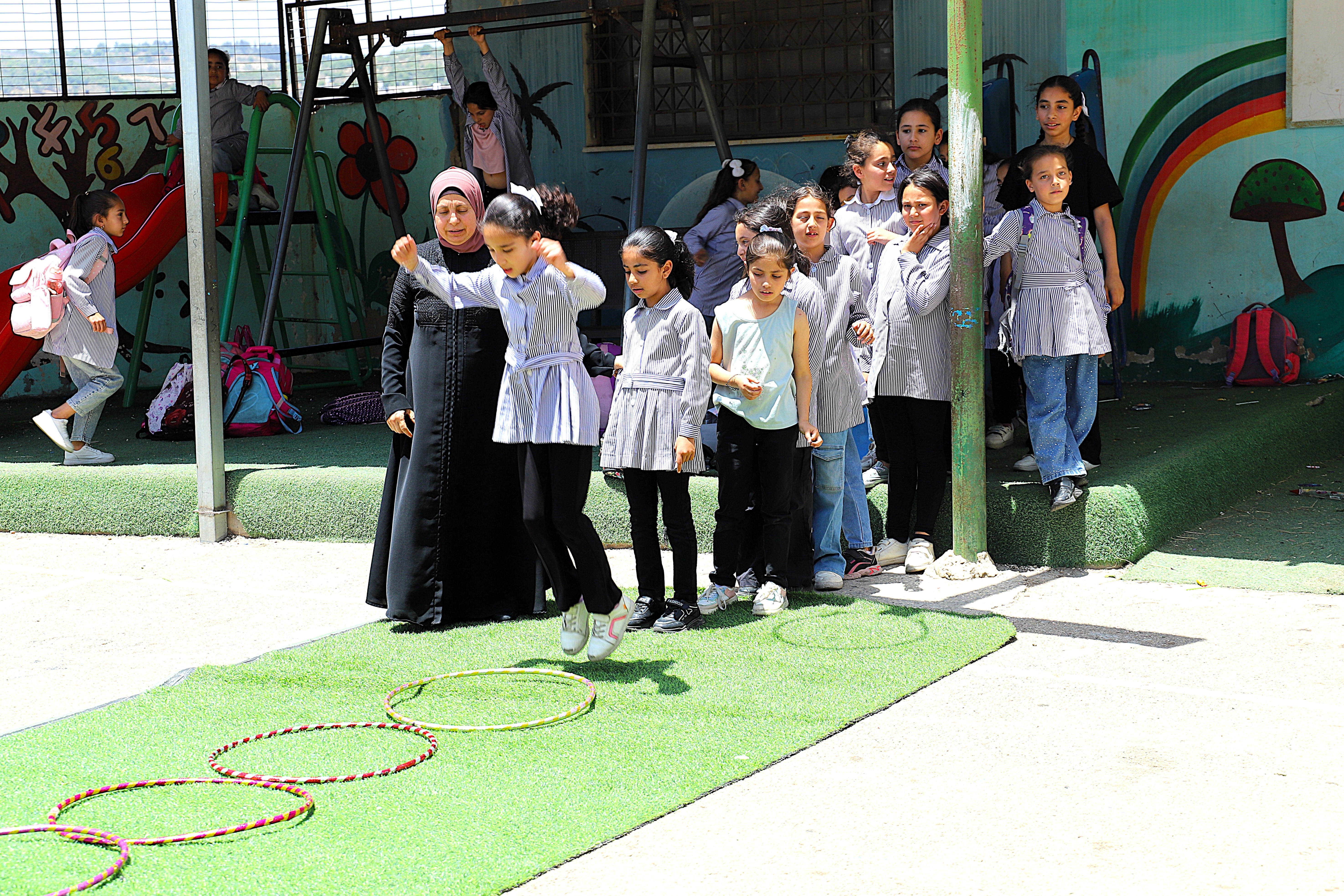 Pic 4: Ms Mansour teaching mathematics using a fun and engaging approach