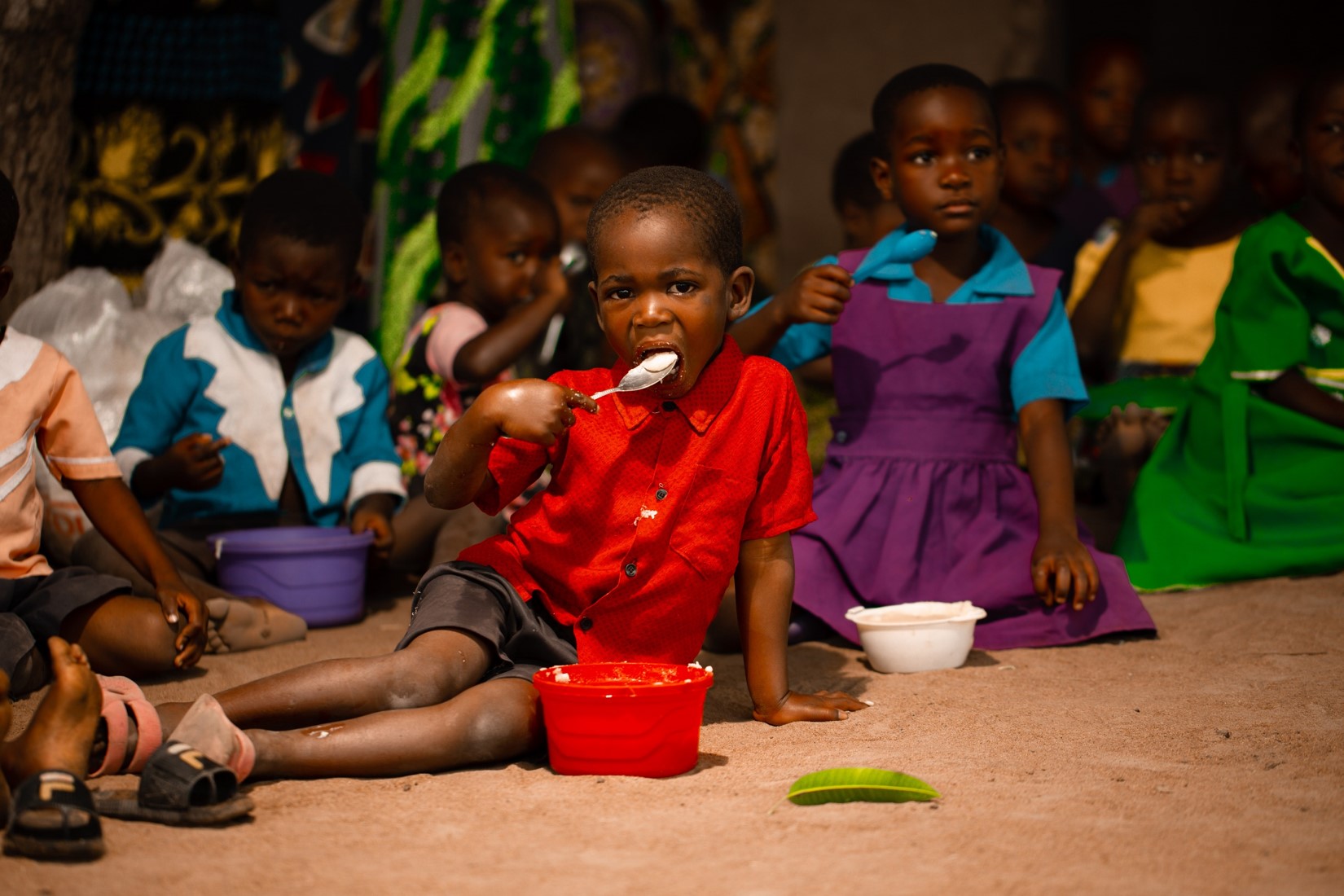 Tilimbike CBCC learners enjoying their porridge.