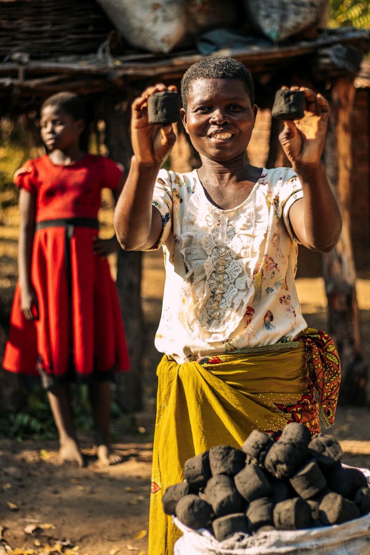 Zhuwaki holding briguettes which are providing source of energy for cooking and also income.