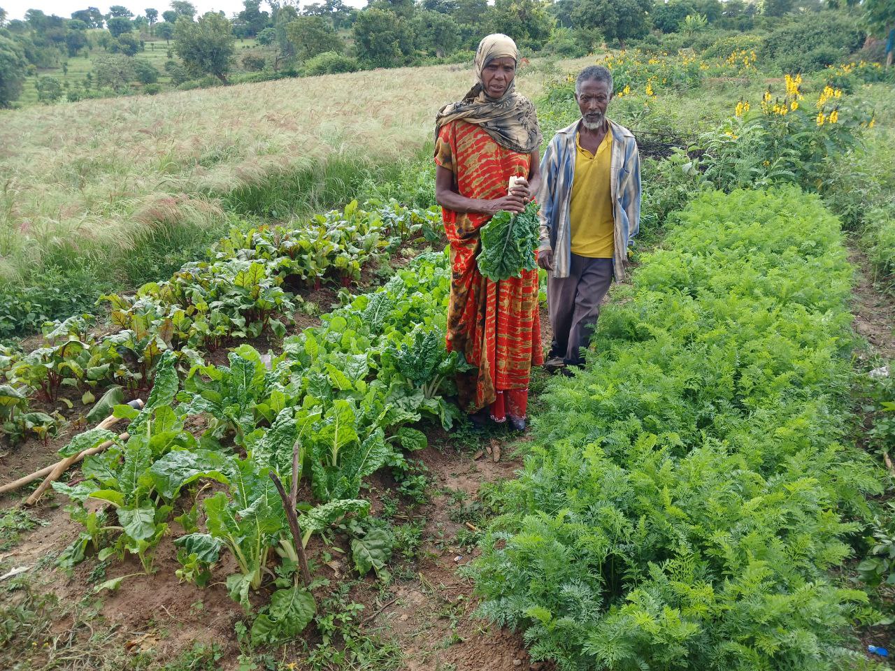 Kedija with her husband at the farm