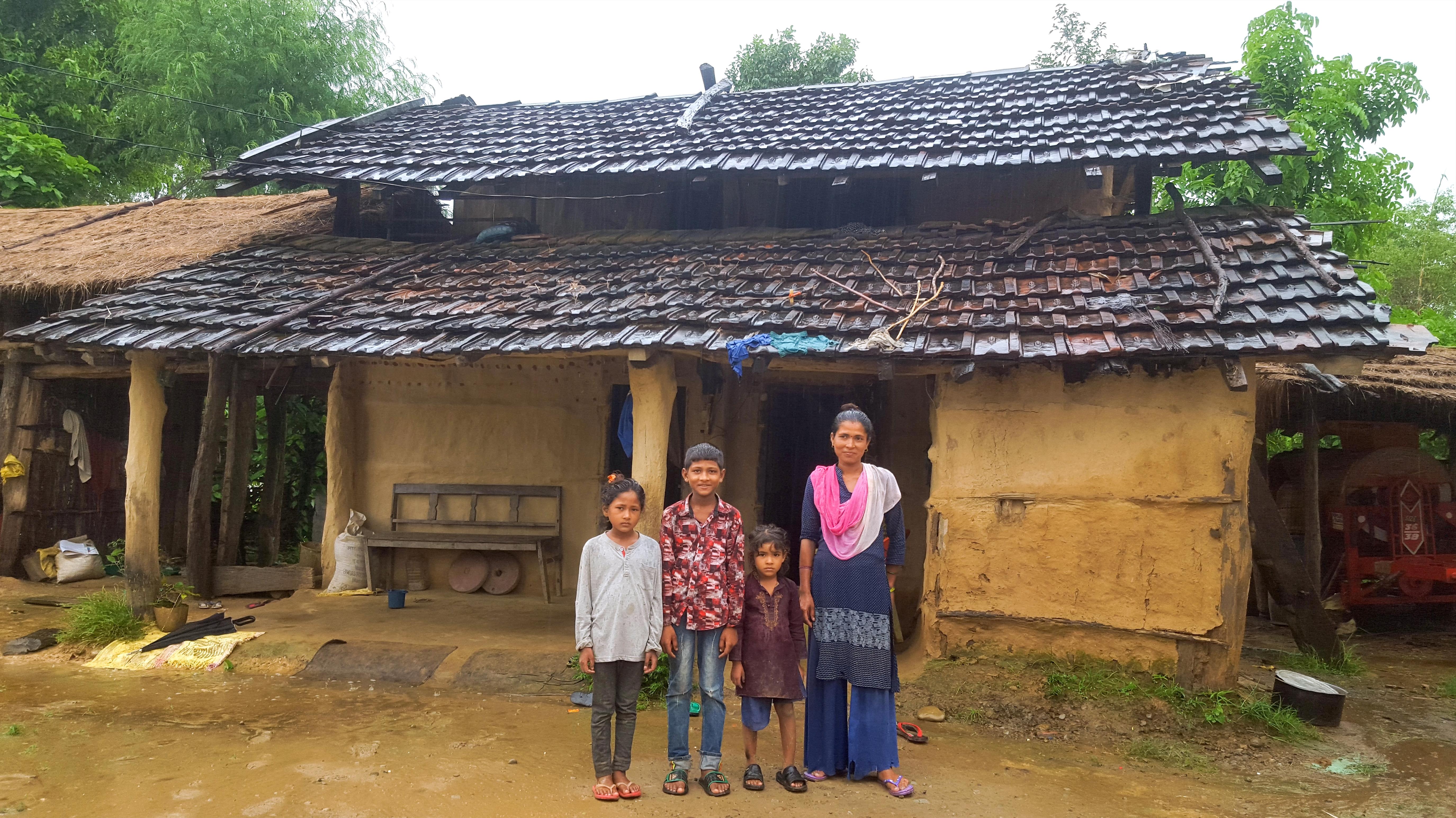 Jiwan with his mother and two young sister