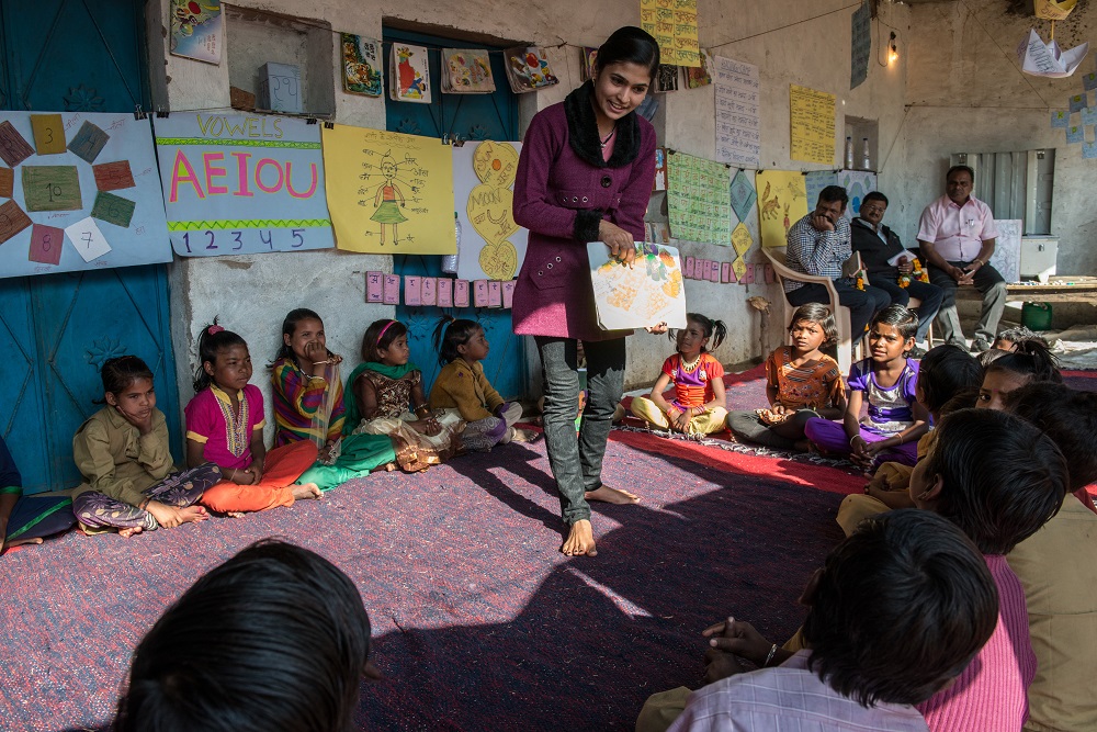 Pooja facilitates a reading camp