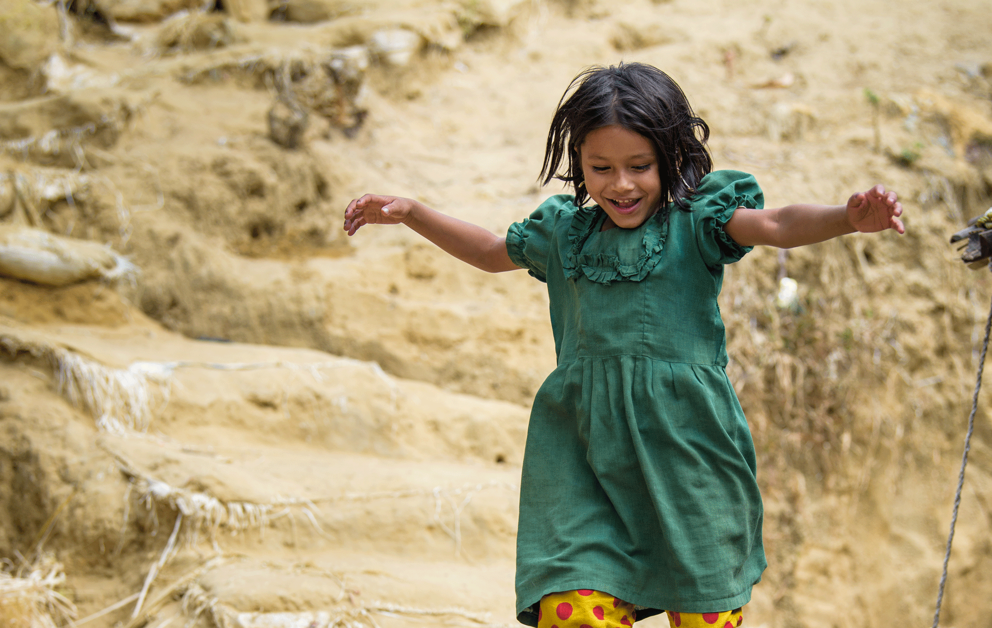 Young girl from Bangladesh jumping