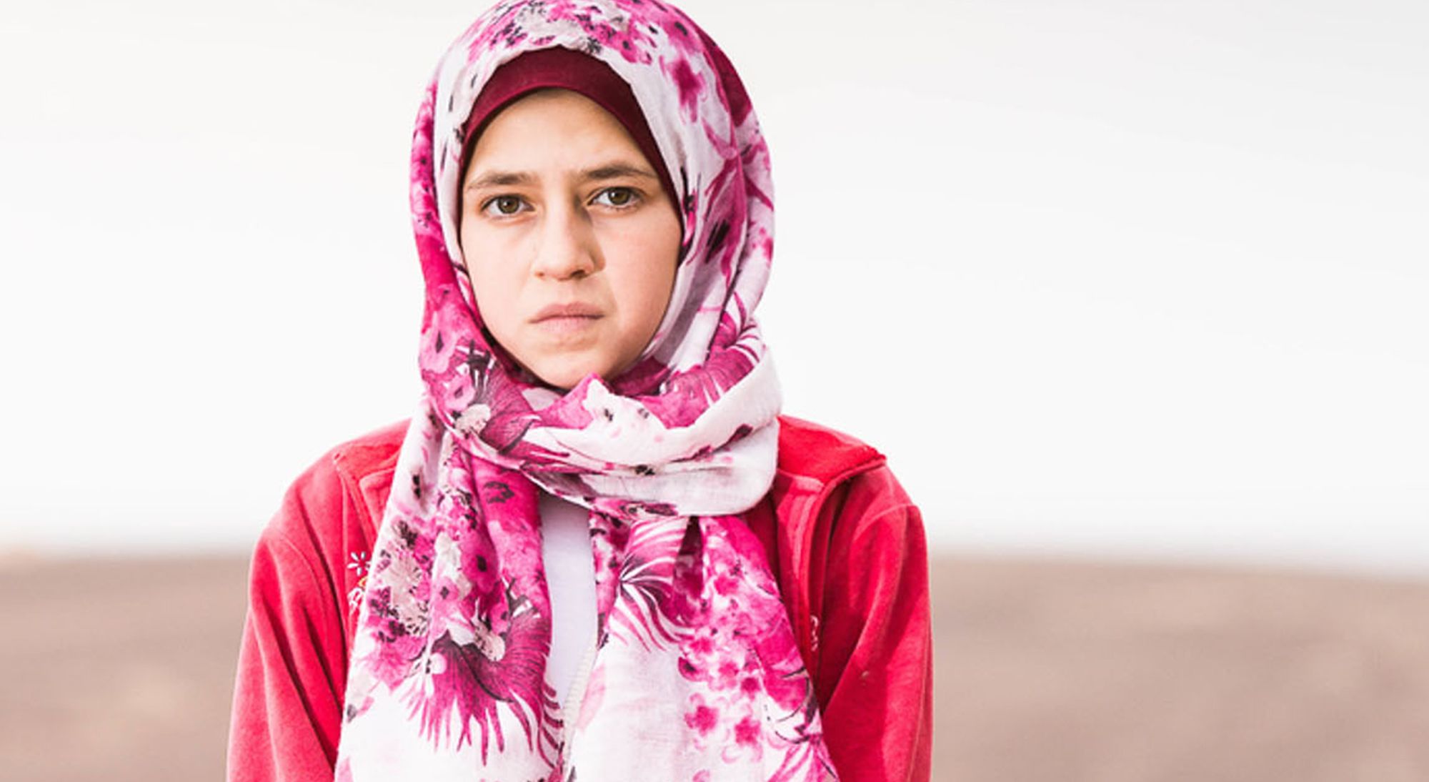 Girl who is sad, walking in the desert.