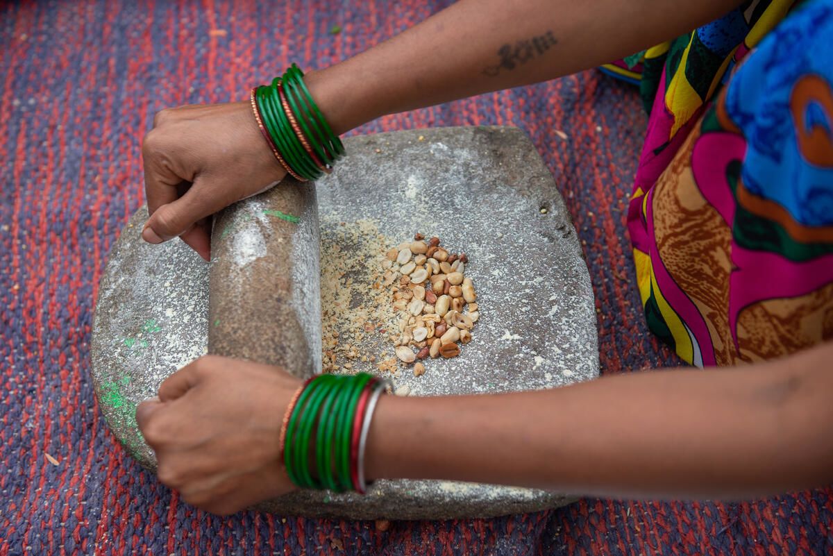 Women's hands cooking food in India