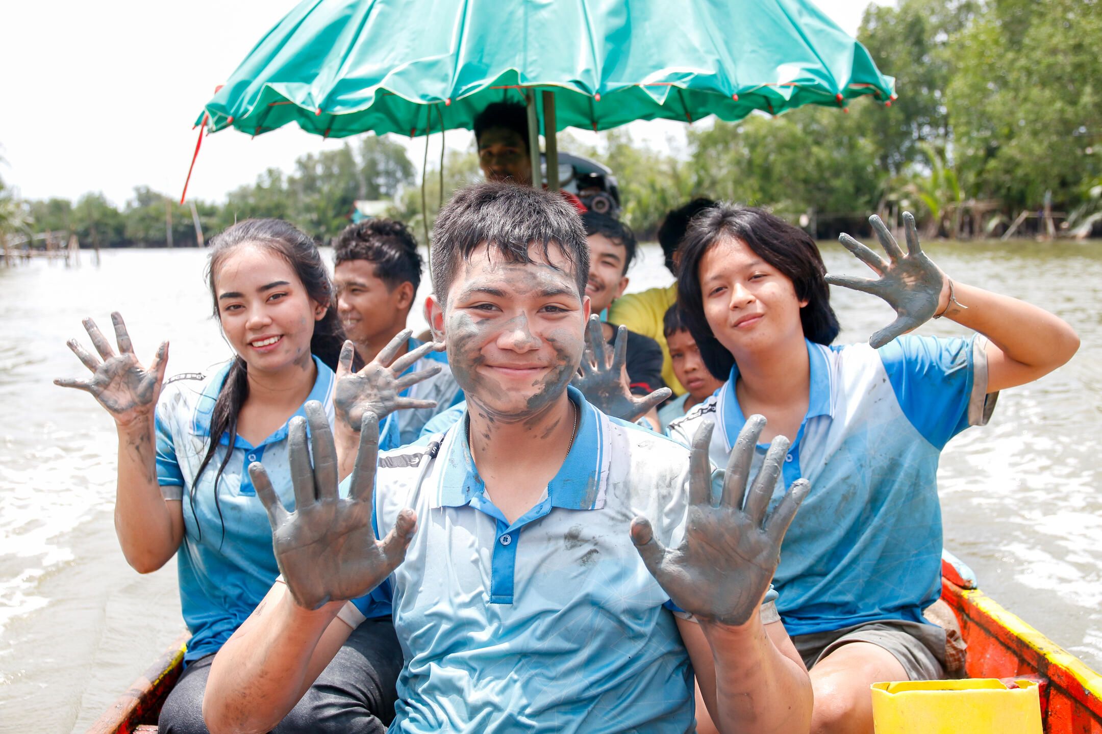 Teens in Thailand work to restore mangrove forests
