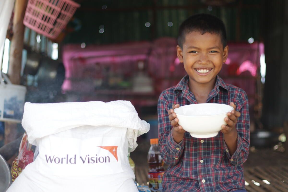 “I will eat two plates of rice!” says Doeurn after his family received an emergency food kit to help them weather the COVID-19 pandemic. 