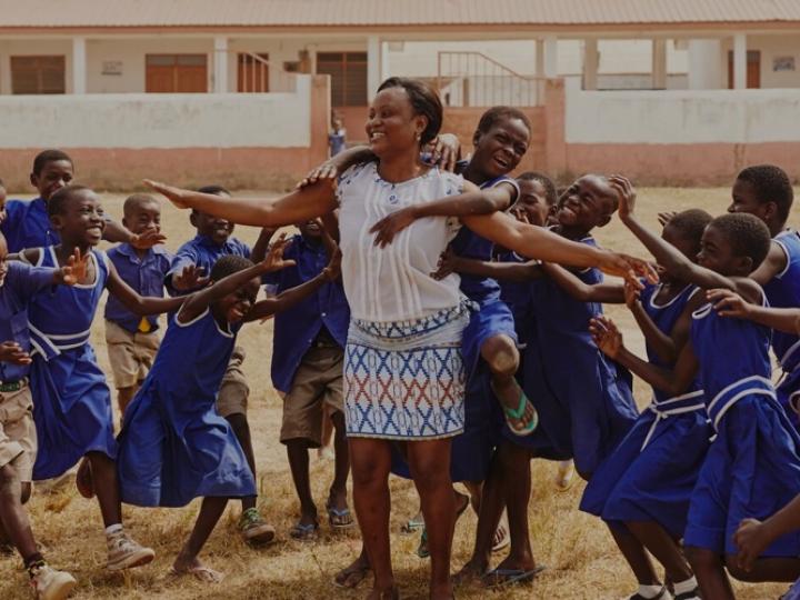 Group of school children with teacher