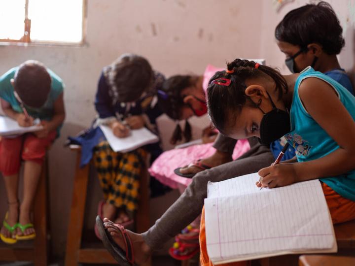 Child studies in her classroom during COVID-19