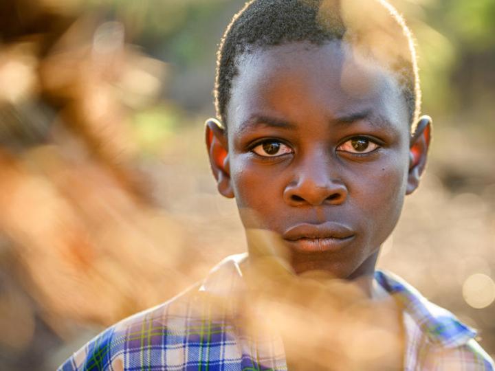 boy standing outside in Africa