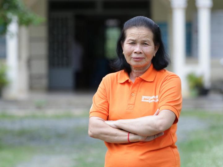 WVI female staff poses for camera outside