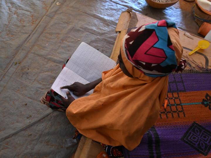 Child works on her homework