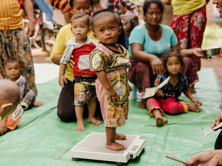 Child being checked for malnutrition in Cambodia