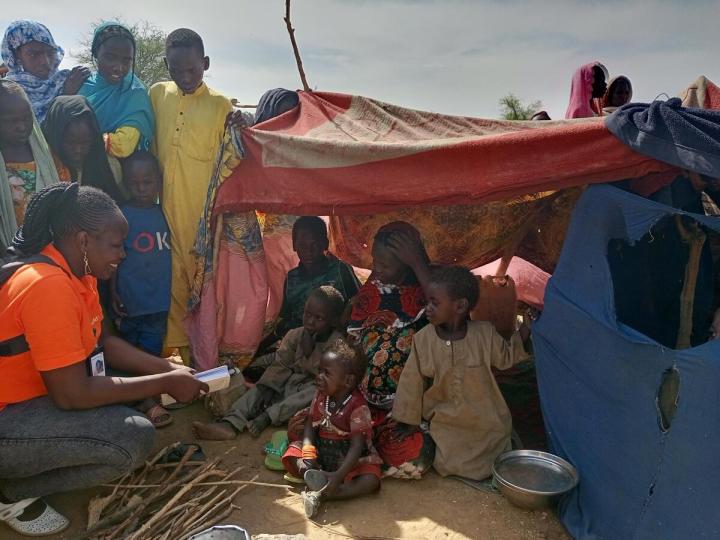 Children fleeing conflict in Sudan take refuge in temporary shelter