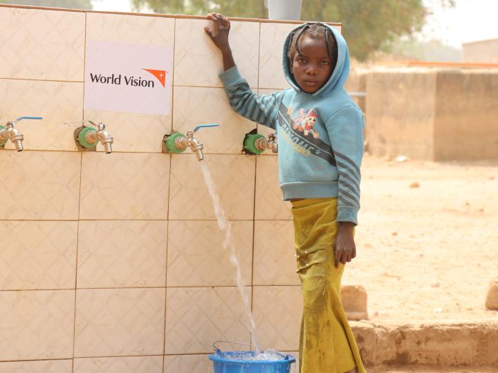 A pupil at the school’s drinking fountain 
