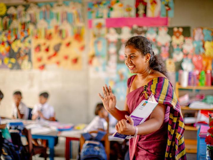 Teacher instructing students in classroom