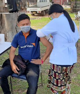 Lao staff getting vaccinated