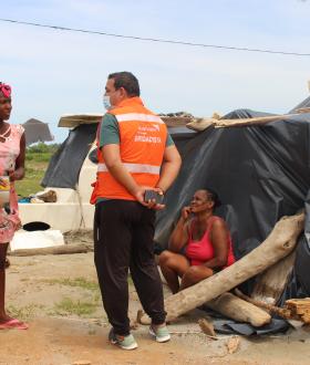 World Vision team interviewing migrant families stranded in Necoclí