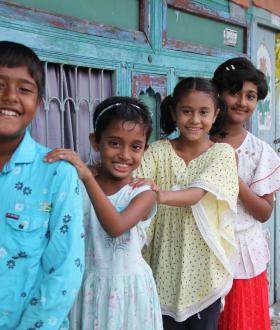 a group of children smiling