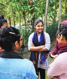 a group of adolescents talking
