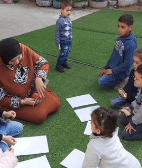 Group of children taking part in a MHPSS activity in the north of the West Bank