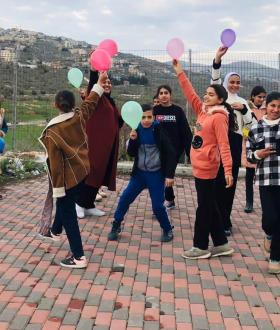 Group of children taking part in a MHPSS activity in the north of the West Bank