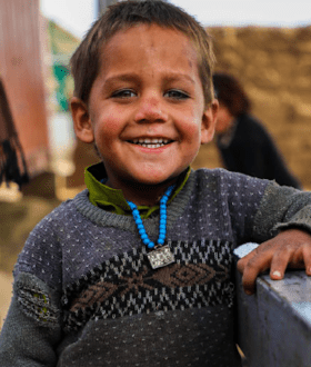 This child picture is from the cover page for Feeding hope: A retrospective on World Vision's Global Hunger Response Phase I