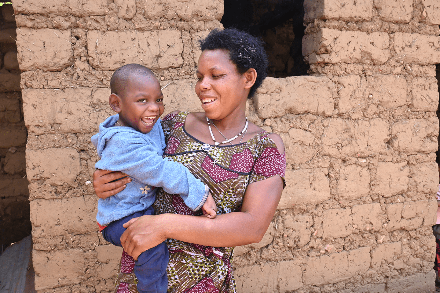 Blandine and her mother after meeting World Vision