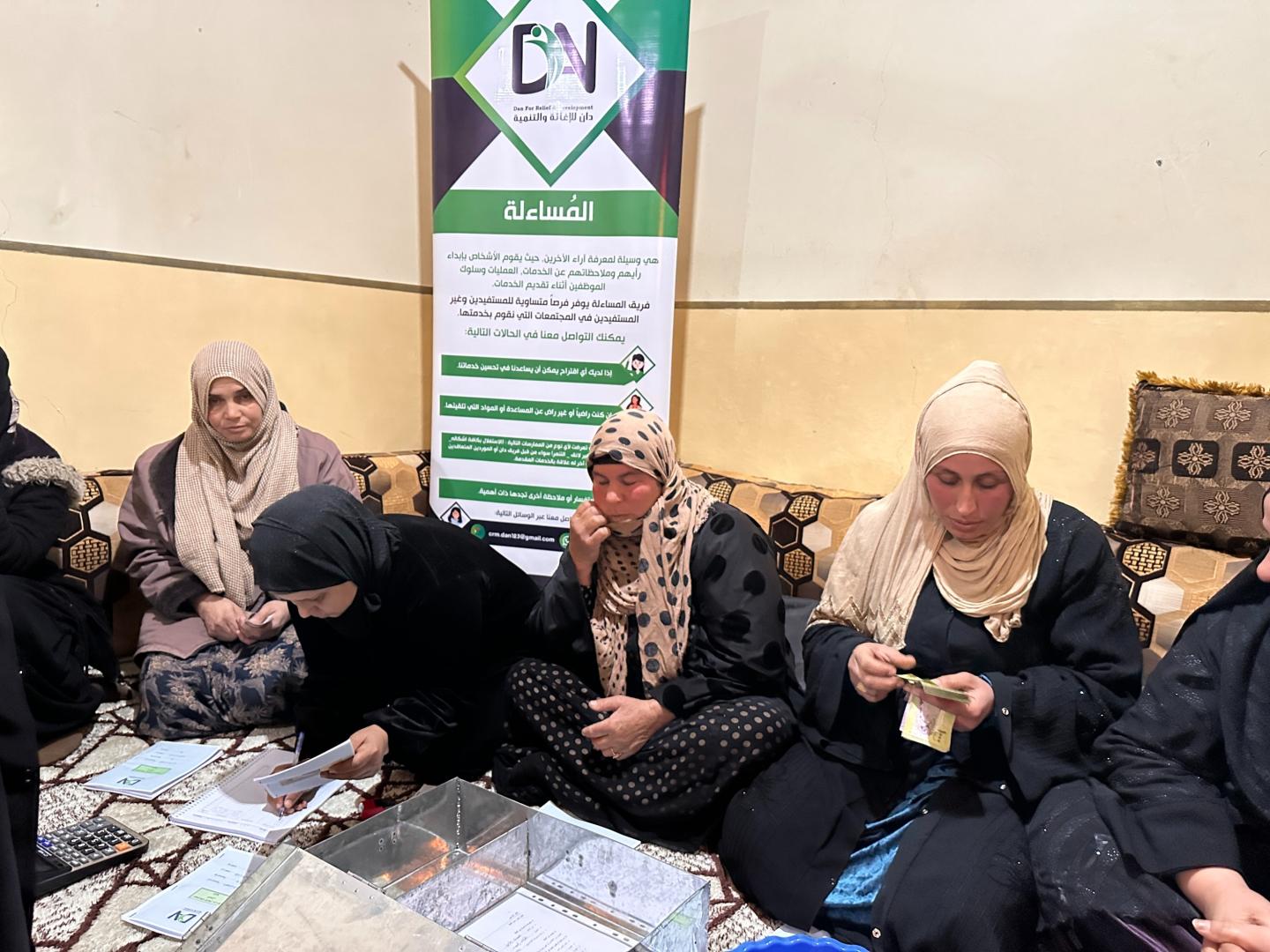 Photo of one of the community’s weekly meetings