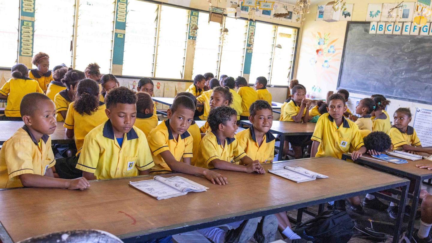 Students at Kupiano Elementary School learning together at newly built tables designed for group seating
