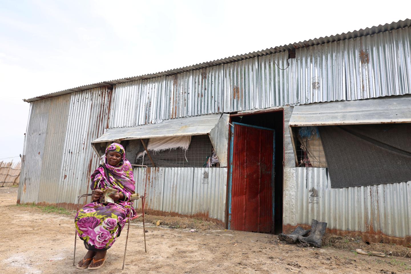 Susanna Infront of her house 