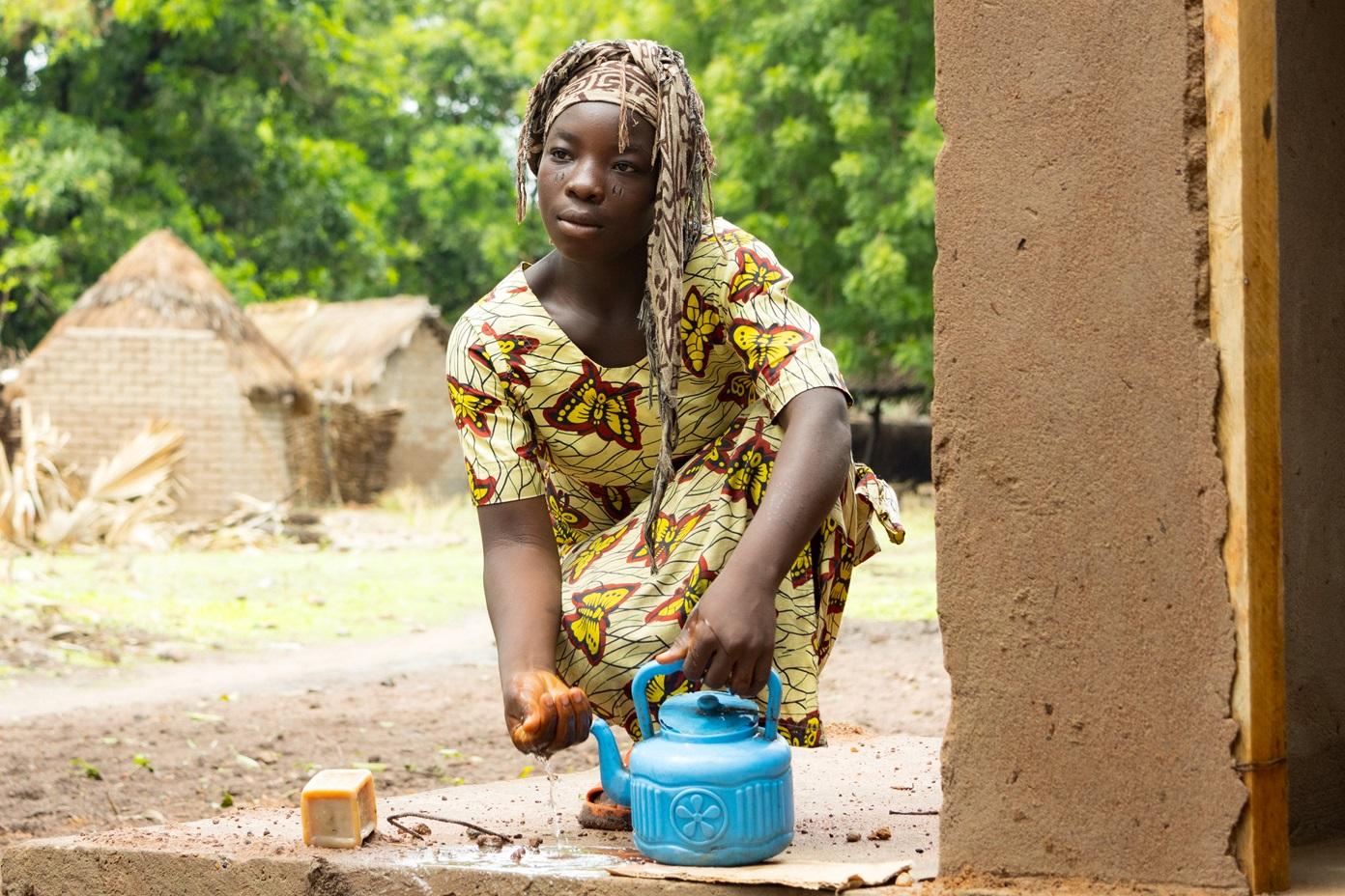 A latrine, a new life for Ernestine.
