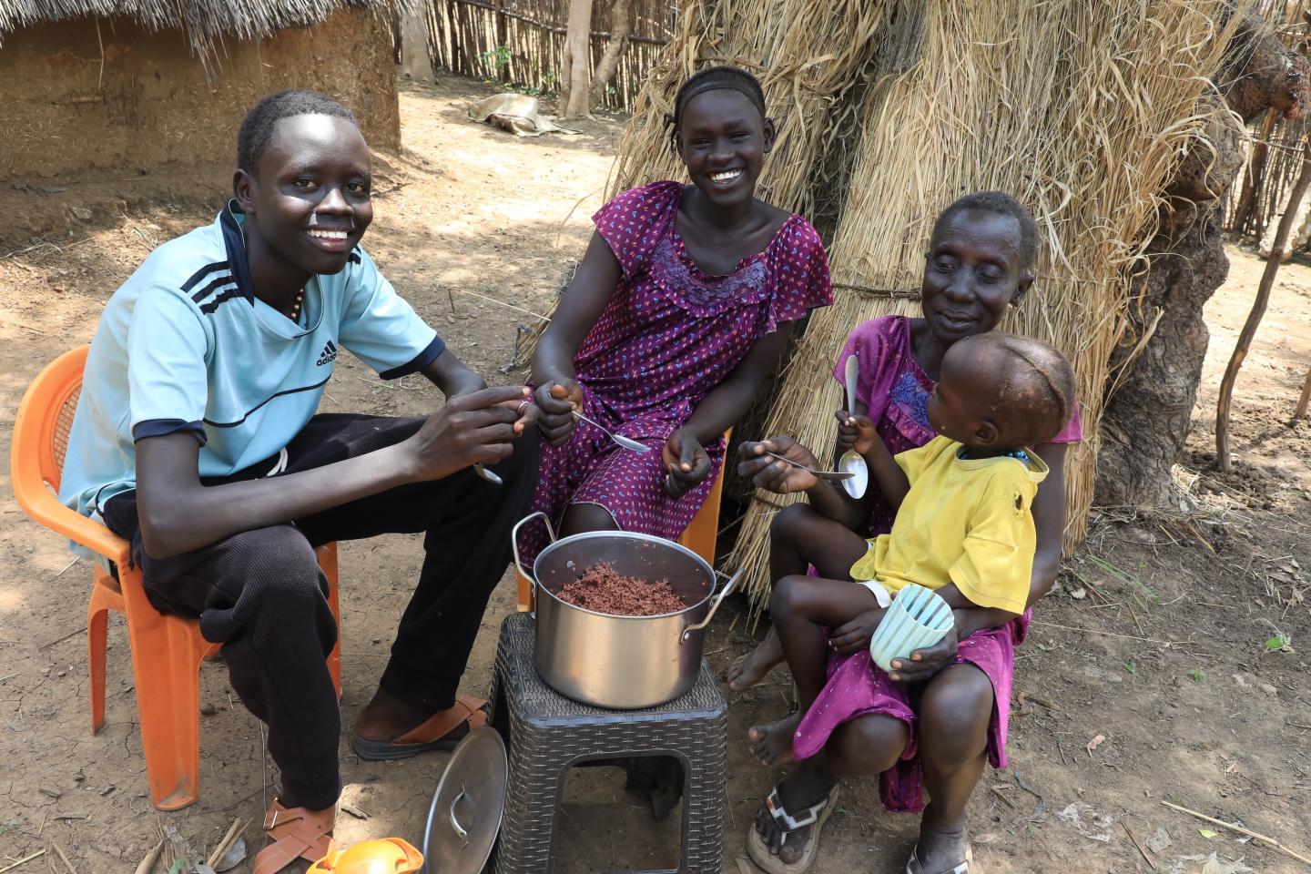 Chankos and his family sharing a meal