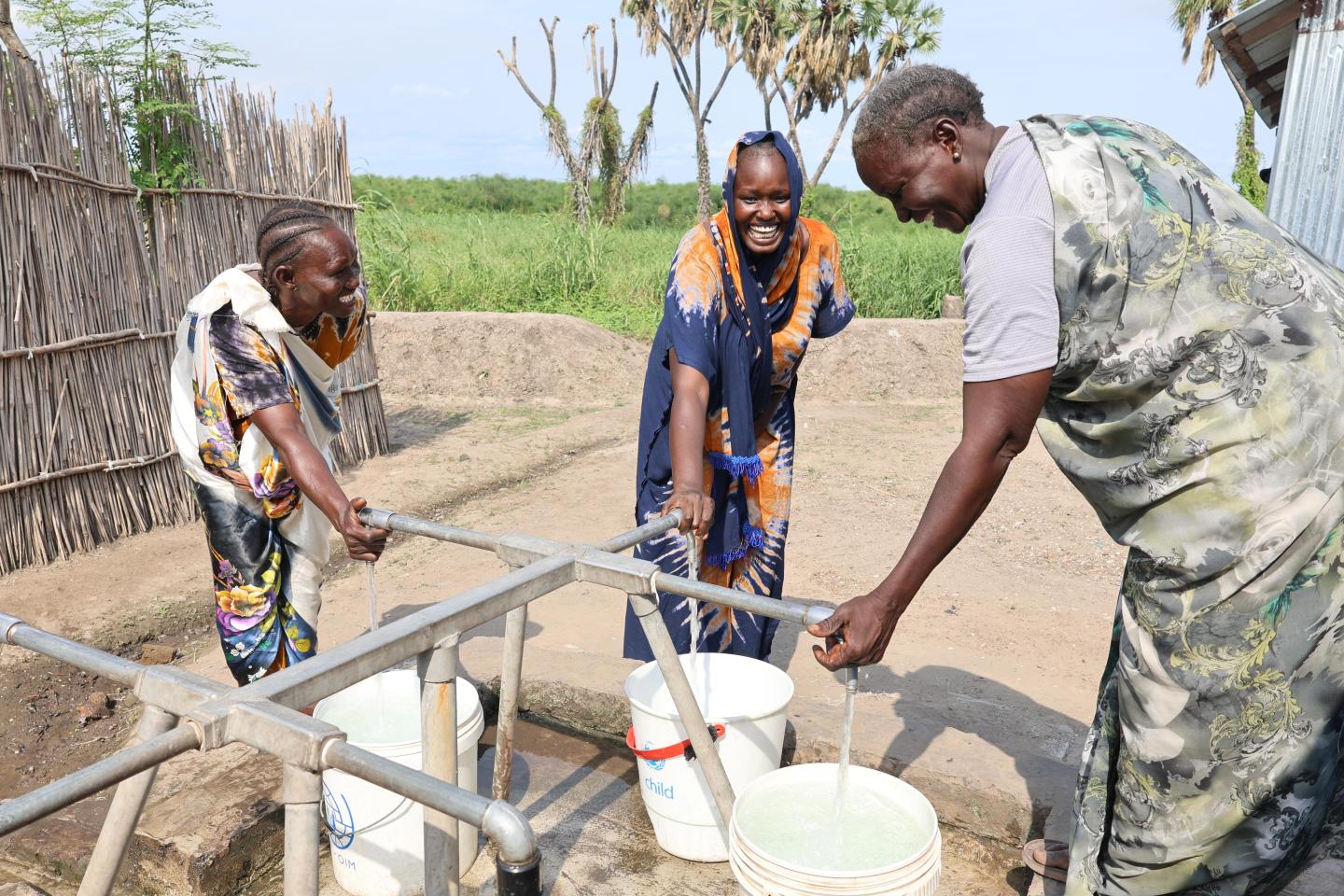 Nyabon and women in the community at the WV water point