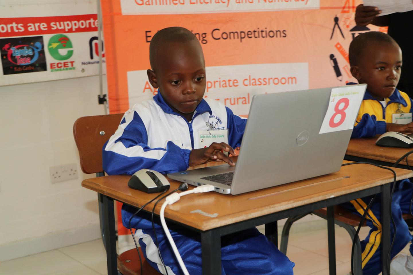 A child learning digital skills through the Enhancing Rural Education for Sustainable Development (ERESD) project in Zimbabwe