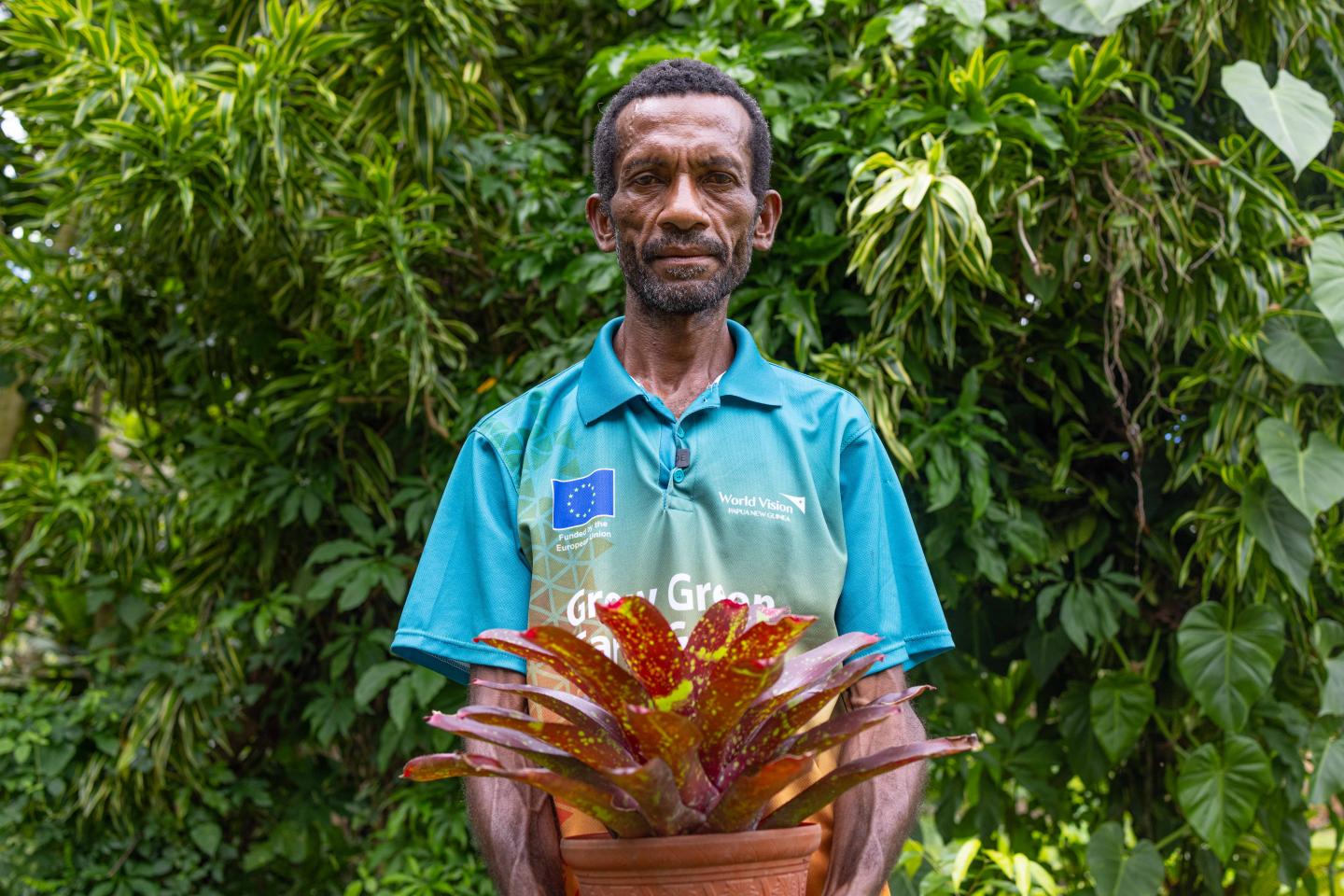 William showcasing flower product