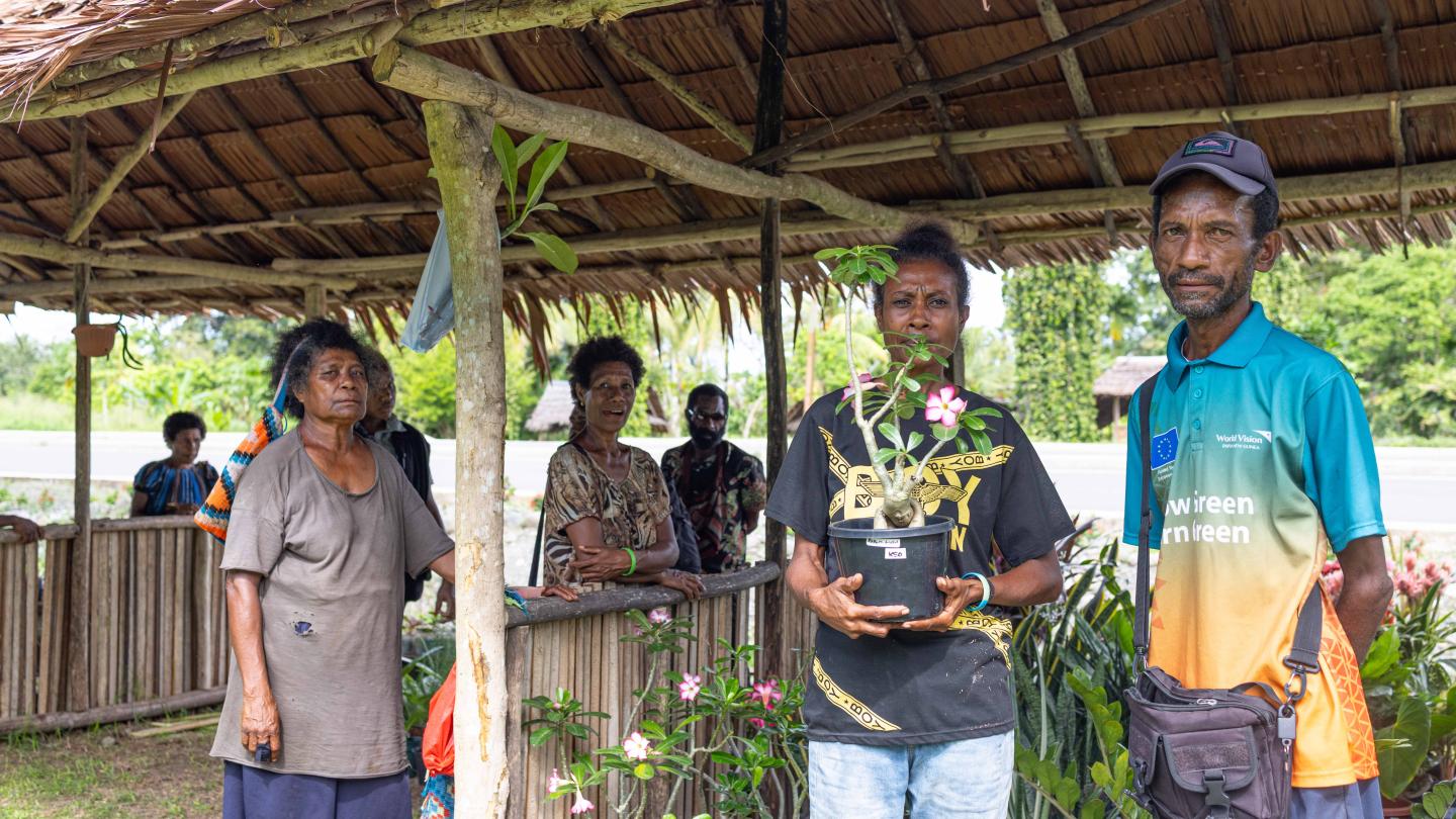 William and the S4T team, showcasing products at the road side market