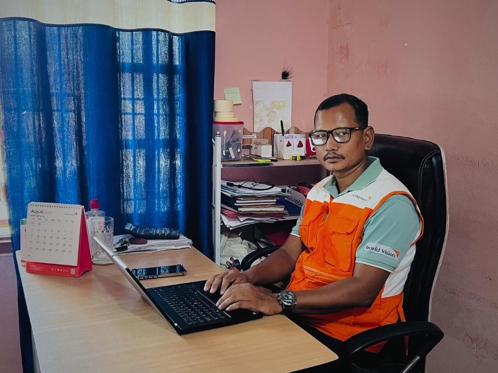 Yogendra Chaudhary at his desk