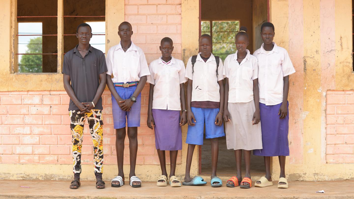 John, teacher and his team 